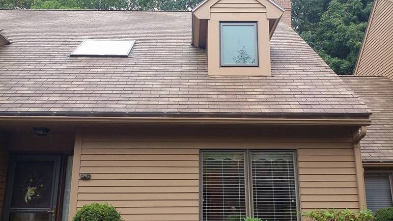 Home with new roof shingles