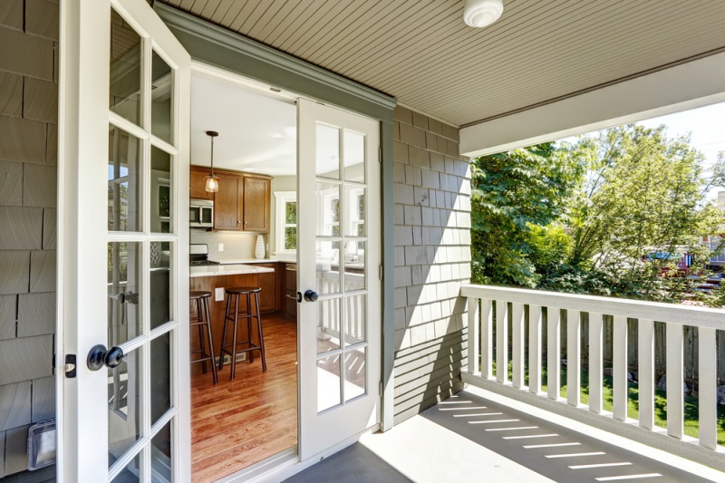 A new beautiful french door opening onto the porch