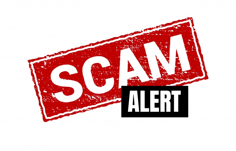 Big word scam with red and white letter and the word alert